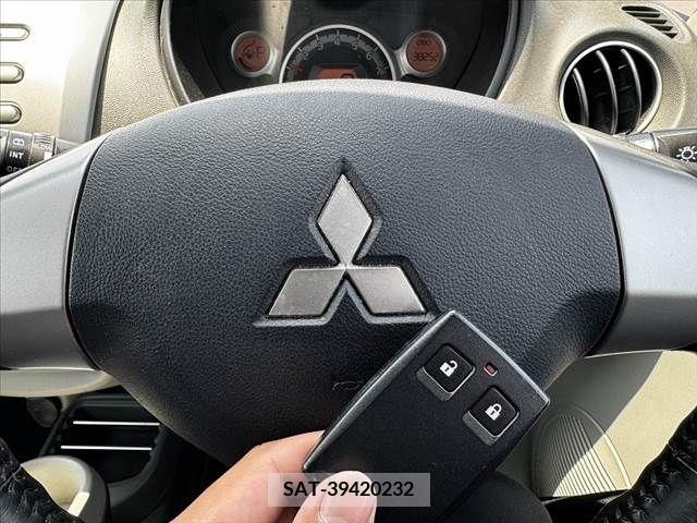 Mitsubishi I 2006-02 387634-21