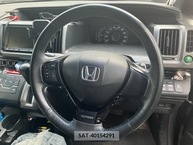 Honda e 2010-06 394333-14