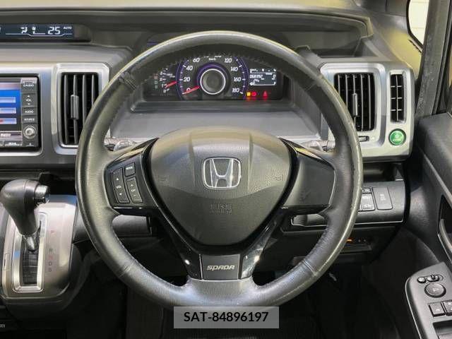 Honda e 2010-02 380391-12